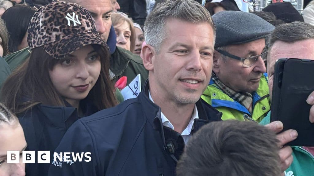 Tens of thousands rally in Budapest as challenger to Orbán leads polls ahead of local elections