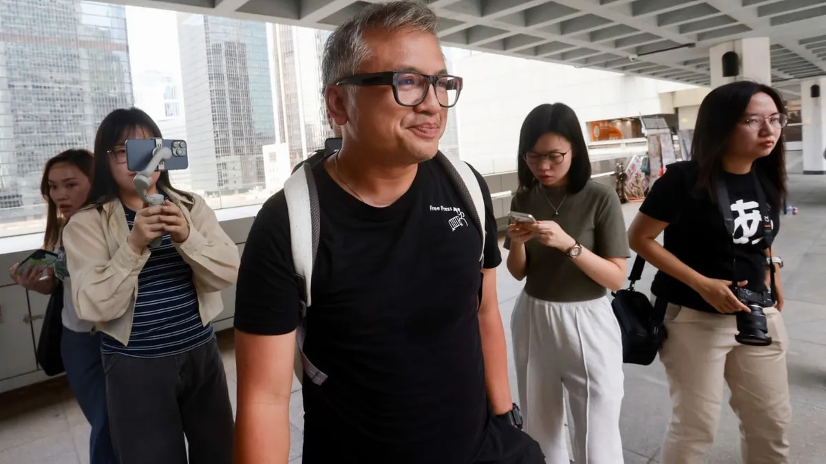 Hong Kong journalist union ex-chief jailed for 5 days over ID card refusal - yes, really