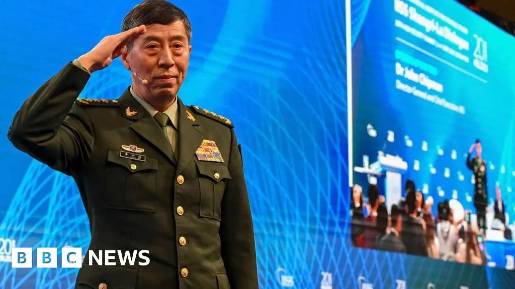 China hands suspended death sentences to former defence ministers