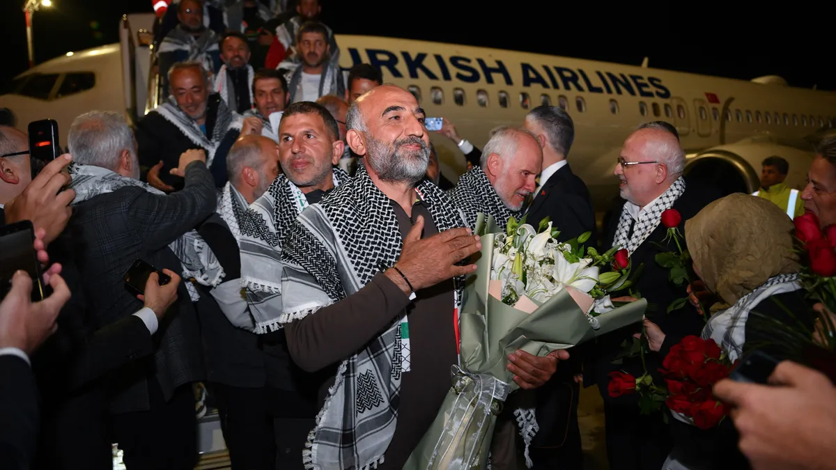Flotilla activists return to Istanbul after Israel detains them at sea