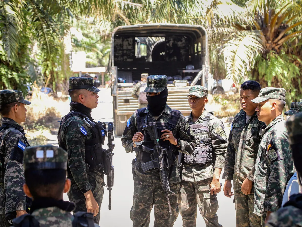 16 dead in Honduras as a police raid and a farm massacre strike the same region hours apart